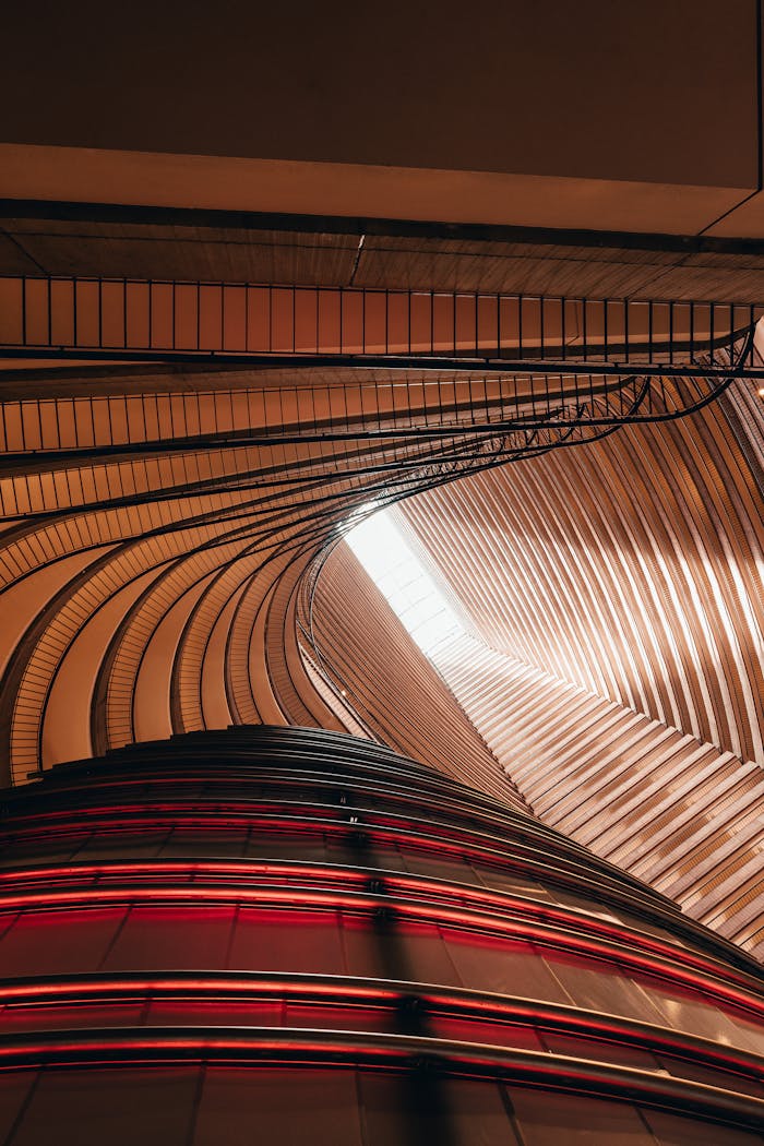 Striking interior view highlighting modern architecture with sunlight streaming through.